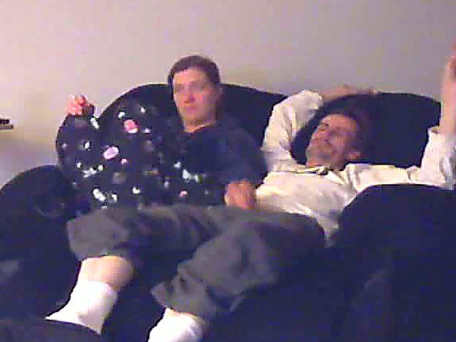 A good looking housewife jerks her husbands cock