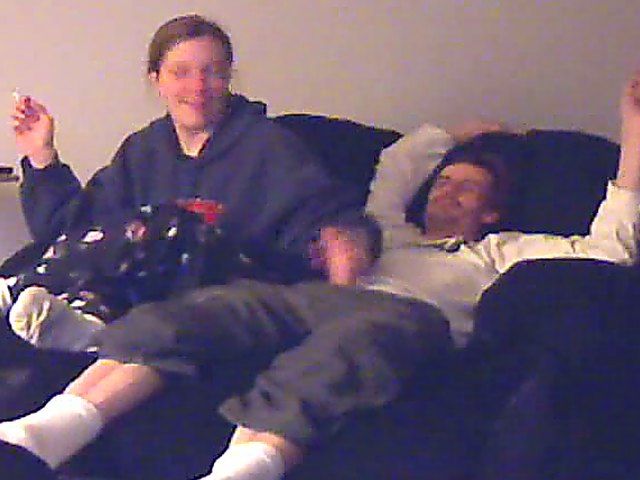 A good looking housewife jerks her husbands cock