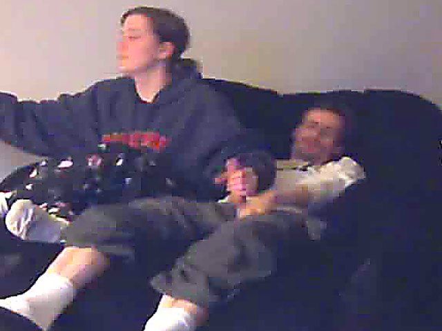 A good looking housewife jerks her husbands cock