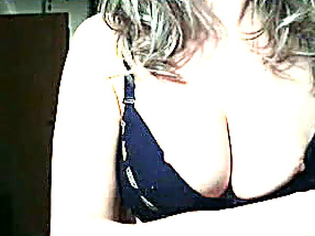 Beautiful babe fingers her tight moist pussy