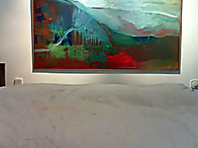 Busty black brunette sucks on an old cock