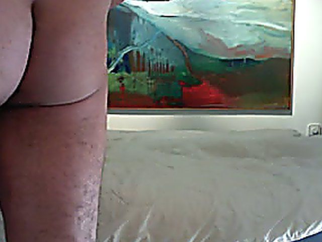 Busty black brunette sucks on an old cock