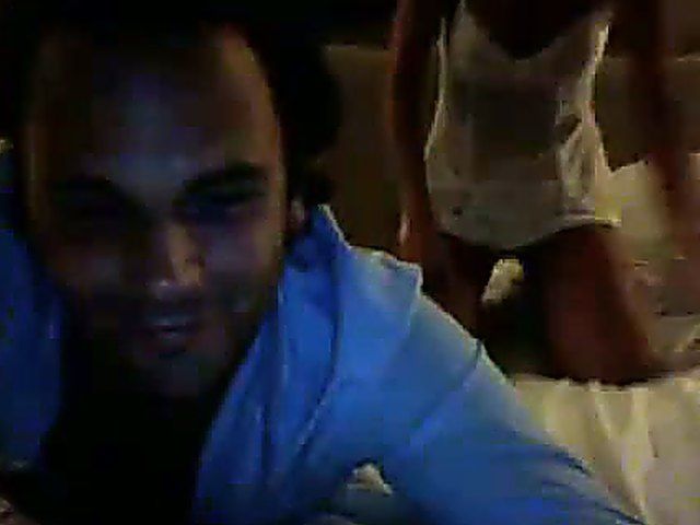 Horny chick wears mask and fingers her holes