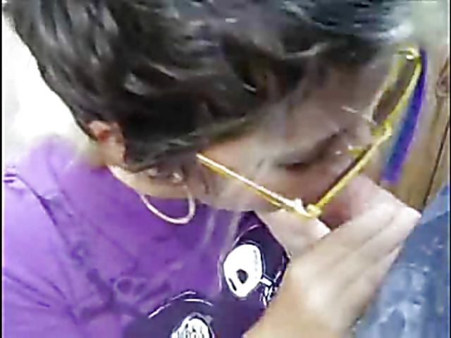 Young girl with pierced lips sucks a cock