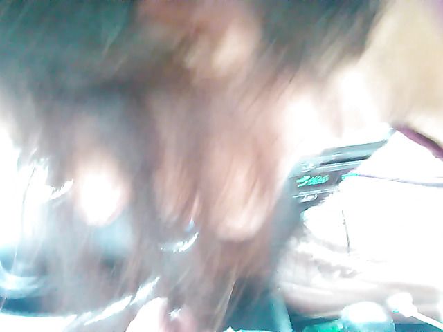 Interracial car blowjob on camera