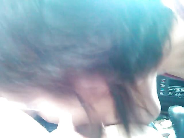 Interracial car blowjob on camera