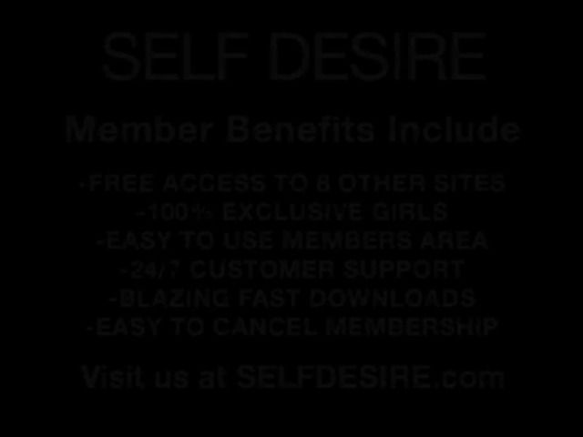 Slim babe toys her bald pussy with her short dress on