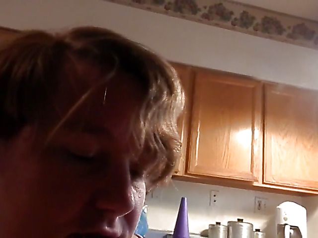 Mature woman eats meaty black cock