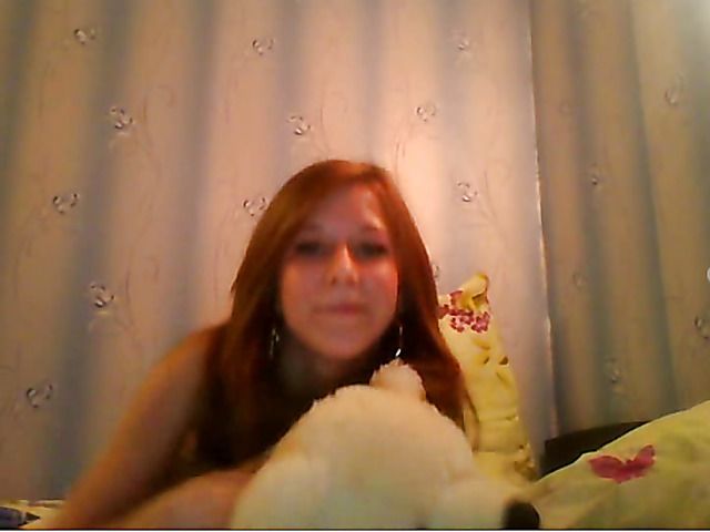 Nude cute redhead and in bed with teddy bear