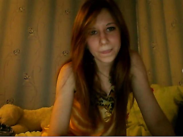 Nude cute redhead and in bed with teddy bear