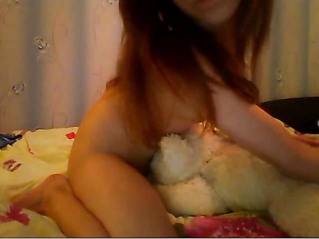 Nude cute redhead and in bed with teddy bear