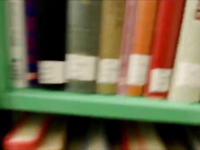 Hottie gets doggystyled between the shelves