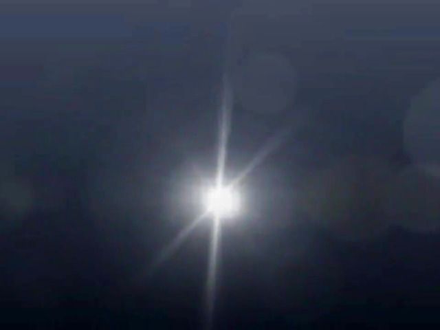 Smoking girl displays her bare soles