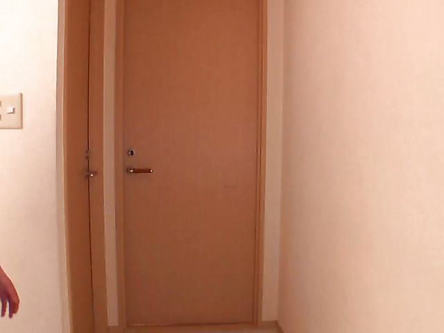 Japanese teen having fun with yellow toy