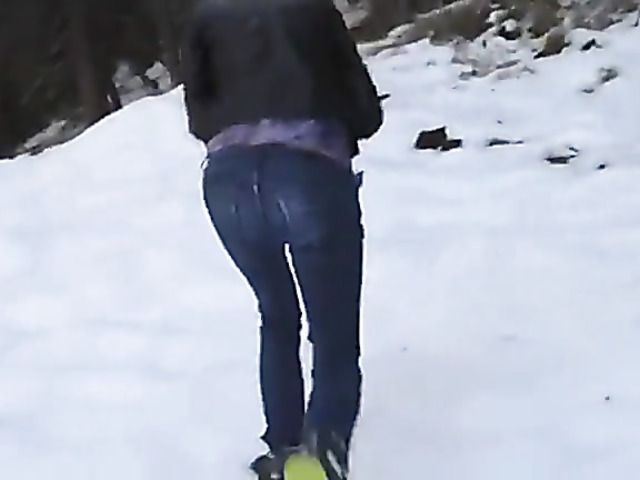 Pussy fingering in the snow with jeans down