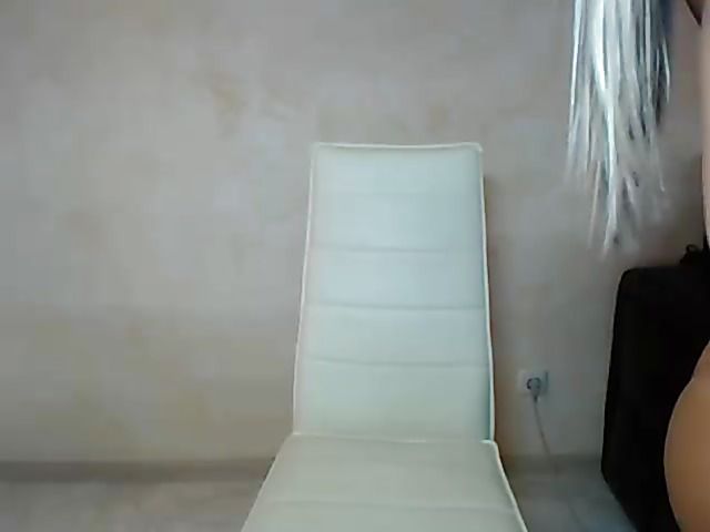 Busty webcam model Barrrbi in red and black