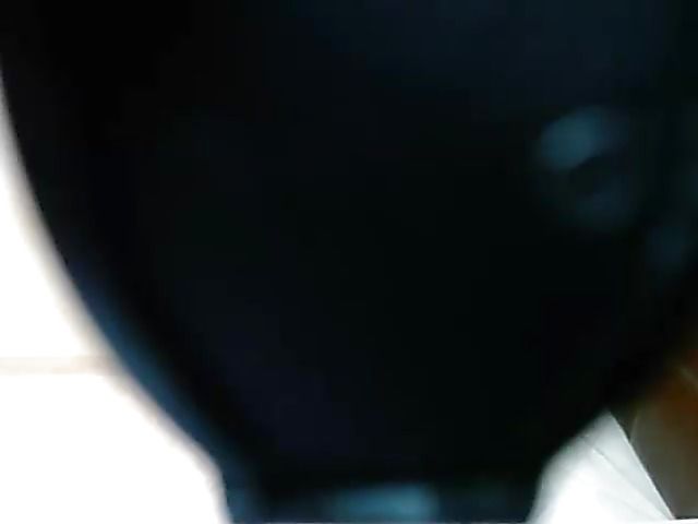 Busty webcam model Barrrbi in red and black