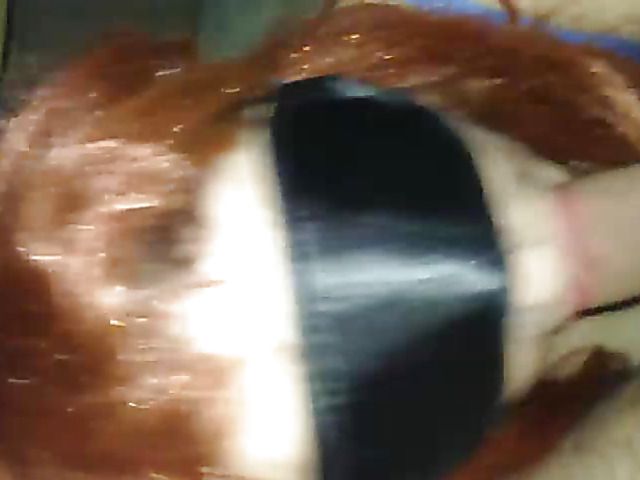 Redhead wife has oral sex with a mask