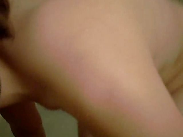 Naked amateur posing and playing in the bath