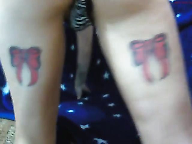 Tattooed cam hottie in panties smokes and masturbates