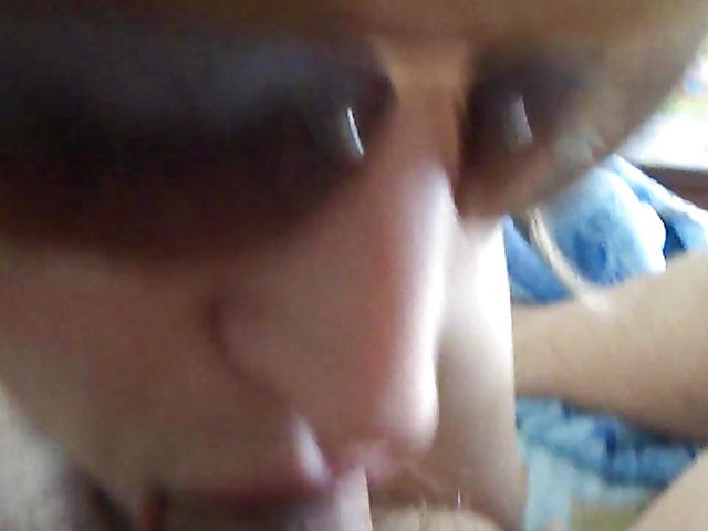 Wife in sunglasses gives blowjob to her hairy husband