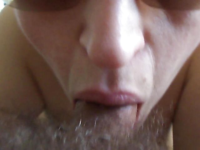 Wife in sunglasses gives blowjob to her hairy husband