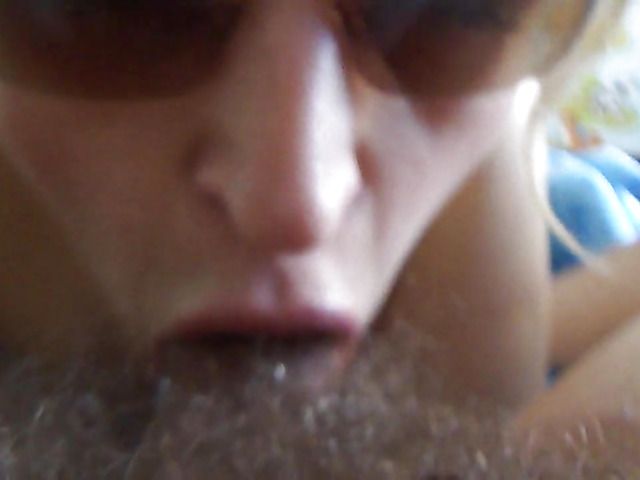 Wife in sunglasses gives blowjob to her hairy husband