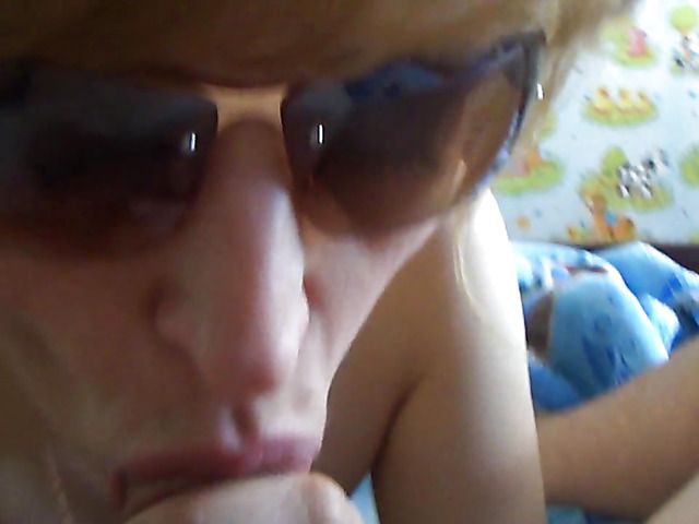 Wife in sunglasses gives blowjob to her hairy husband