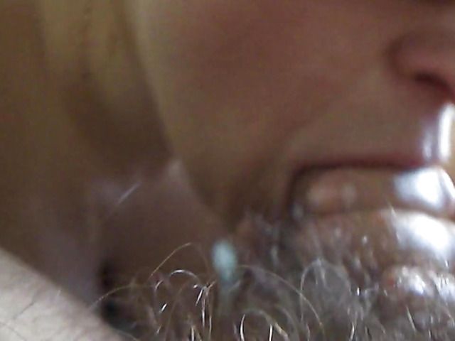 Wife in sunglasses gives blowjob to her hairy husband