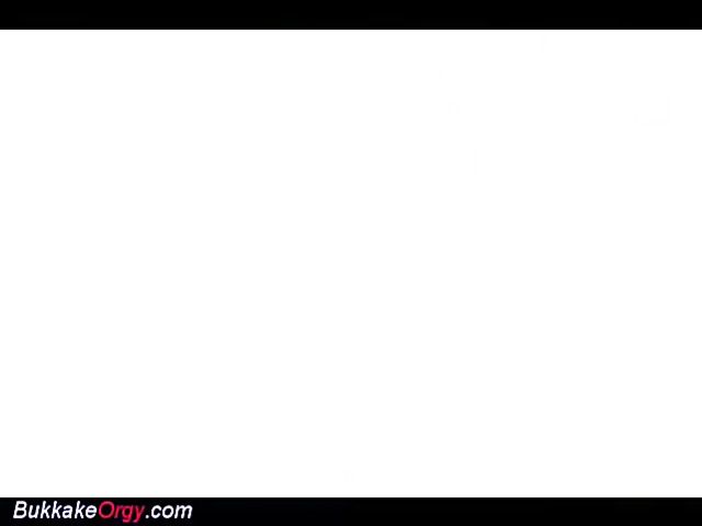 Skinny brunette beauty enjoys a bukkake orgy