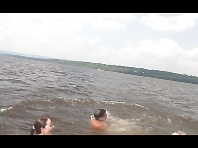 Bad girls give blowjob and kiss on a boat