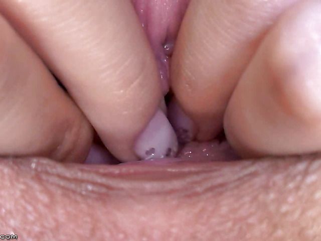 Blue Angel pulls her pink pussy inside out in close up