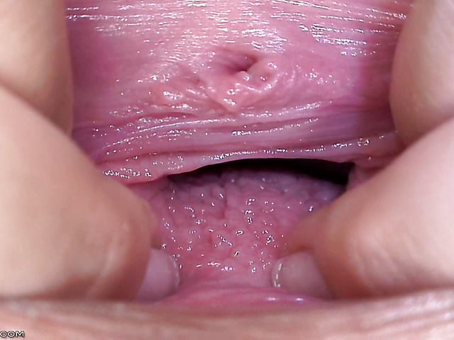 Blue Angel pulls her pink pussy inside out in close up
