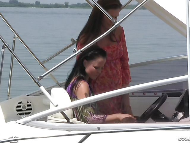 Bikini girls have lesbian sex on a boat