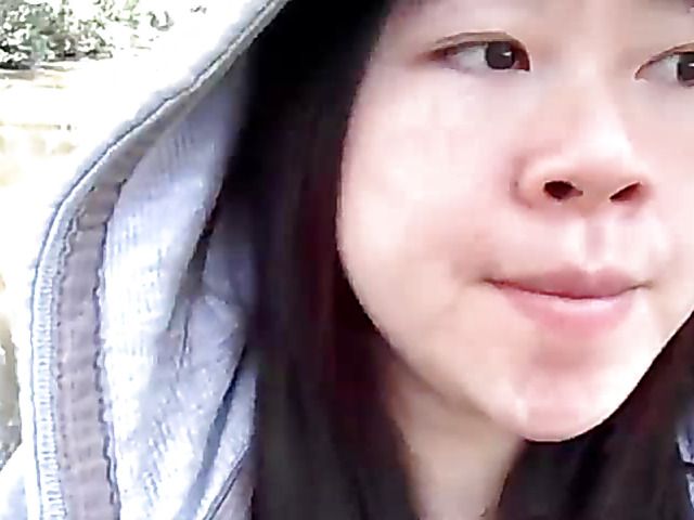 Asian beauty blowing fat dick outside