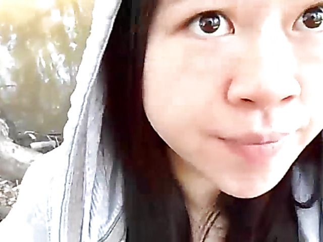 Asian beauty blowing fat dick outside