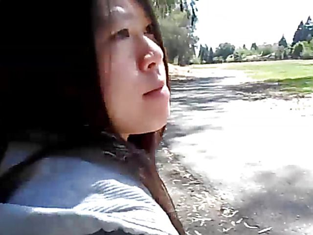 Asian beauty blowing fat dick outside