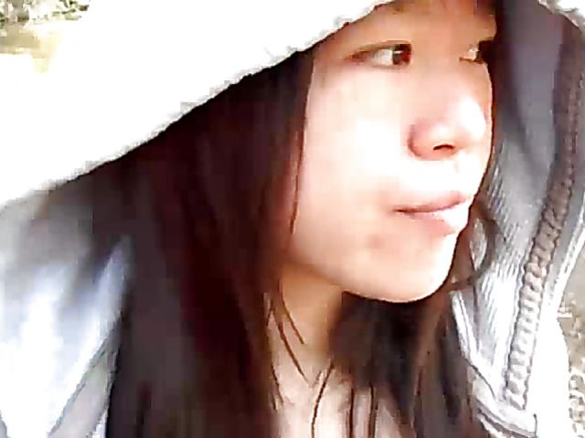 Asian beauty blowing fat dick outside