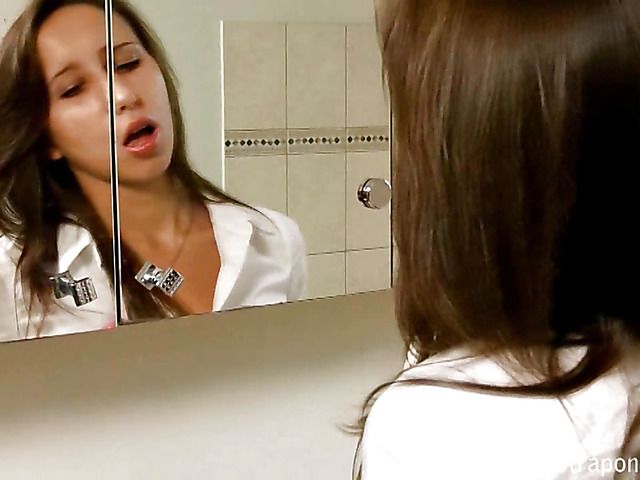 Girl with strap-on jerks off in the tub with her pantyhose on