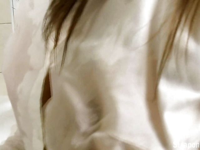 Girl with strap-on jerks off in the tub with her pantyhose on