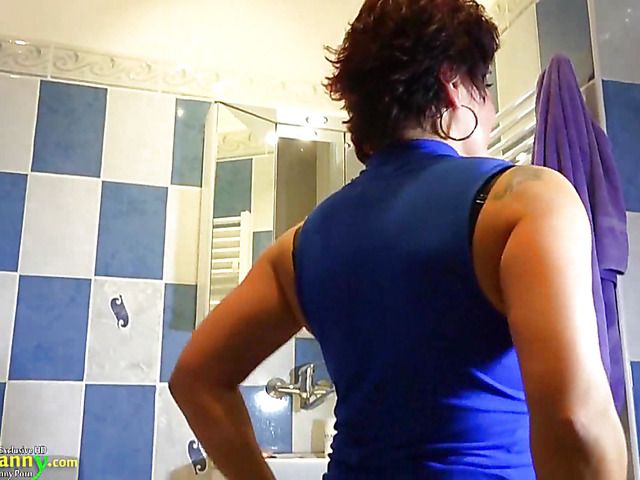 OldNanny Busty granny is doing striptease