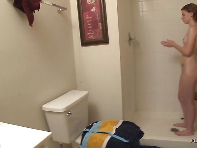 Teen Aubrey Belle takes a shower and toys her pink pussy