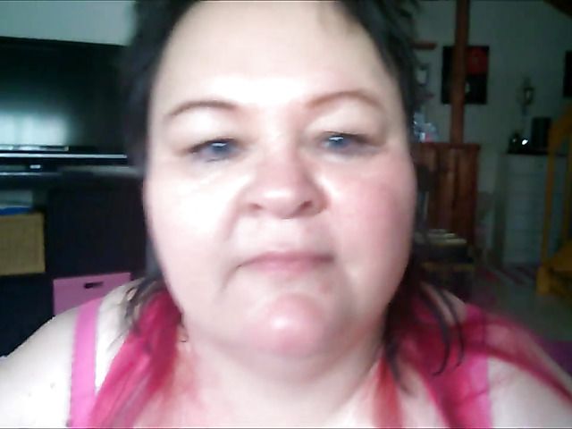 Obese amateur granny playing with a dick