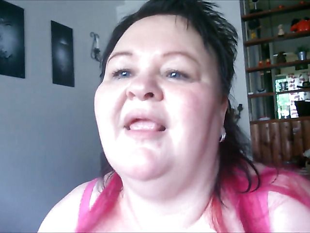 Obese amateur granny playing with a dick