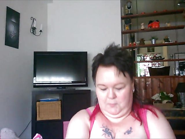 Obese amateur granny playing with a dick