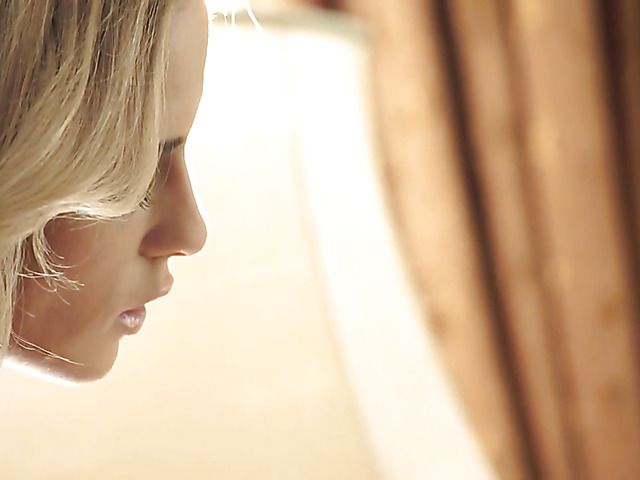 Stunning blonde enjoys foot fetish sex by the fire