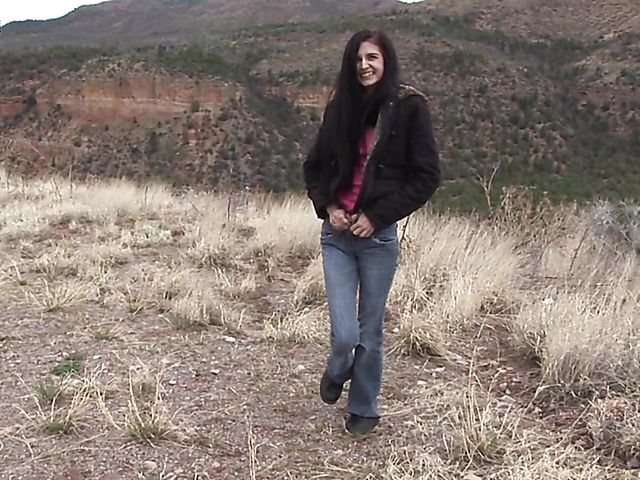 Brunette girl with shaved pussy peeing on the roadside