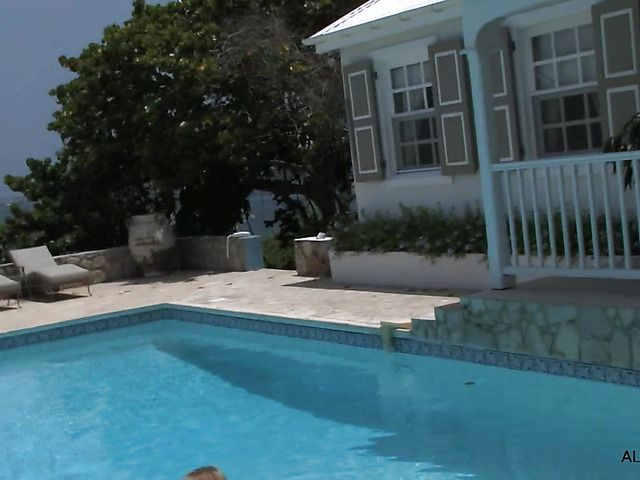 Bikini girl with shaved pussy posing and peeing outdoors