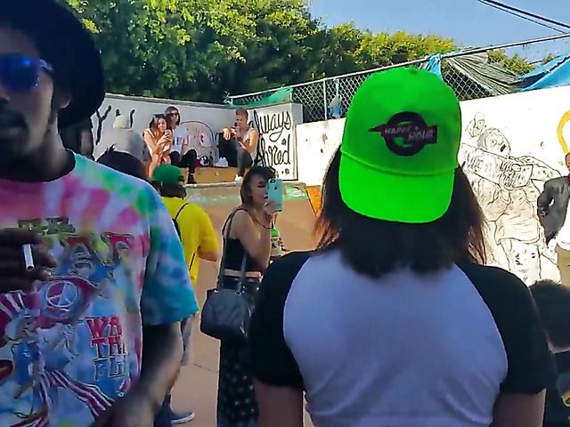 Wet amateur chicks go topless in public