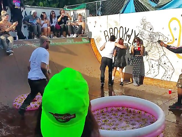 Wet amateur chicks go topless in public